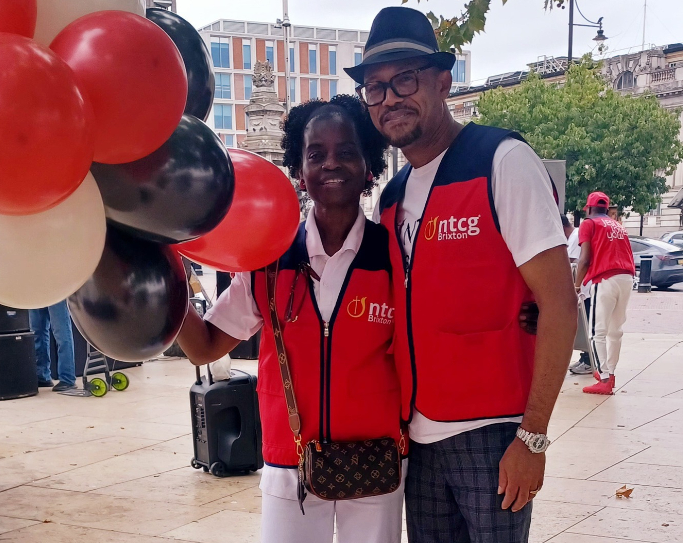 two people with balloons